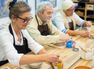 3 people doing crafts